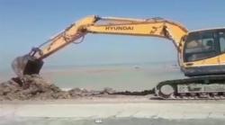 تلاش گروه تفحص شهدا در هدایت سیلاب خوزستان بسوی دریا